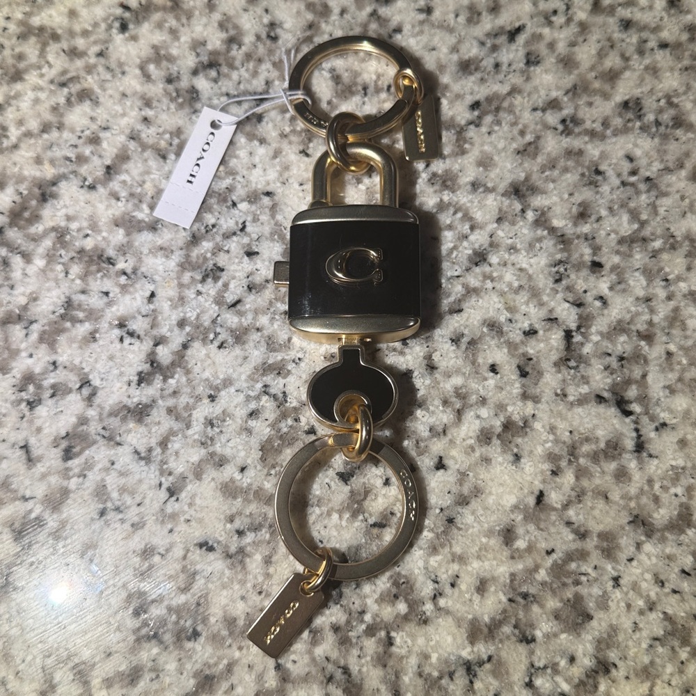 Coach Black and Gold Lock Keychain